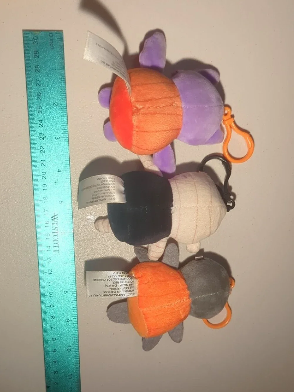 Cute Halloween Plush Keychain Set – Purple Bat, Black Skeleton & Gray Pumpkin